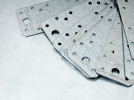 Metal working tools. Metal style. Metal preparations and fixing elements on the scratched metal...