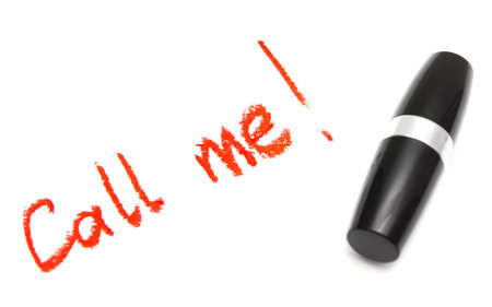 Inscription red lipstick. On a white background.の写真素材