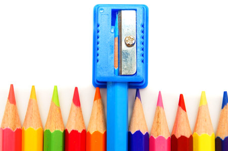 Sharpener and pencils on a white background.の写真素材