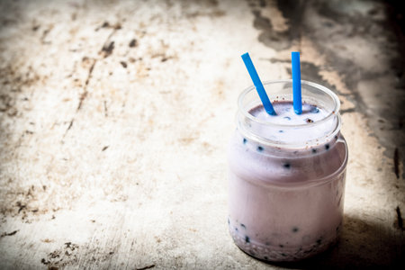 Blueberry smoothies. On an old rustic background.の写真素材