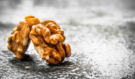 Walnuts . On the rustic background. Free text spaceの写真素材