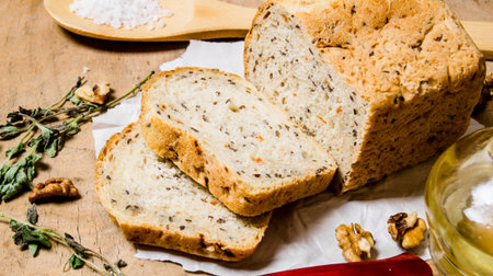 Fresh bread with oil , salt and herbs. On wooden background.