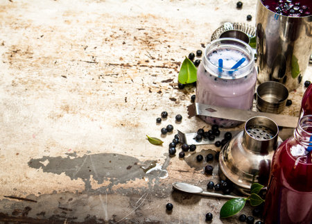 Blueberry smoothies and fresh cocktails. On an old rustic background.の写真素材