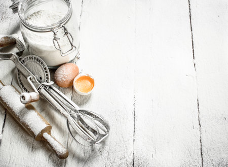 Baking background. Tools and ingredients for the dough.の写真素材