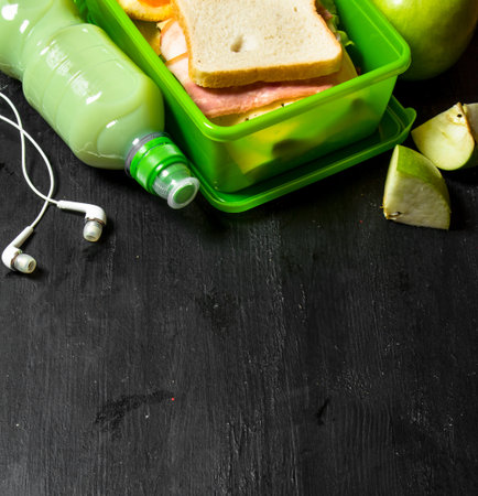 Morning picnic. Sandwiches a milkshake and fruit.の写真素材