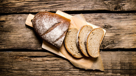 Sliced rye bread on a Board. On a wooden table. Top view