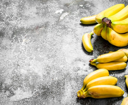 Fresh ripe bananas . On a rustic background.の写真素材
