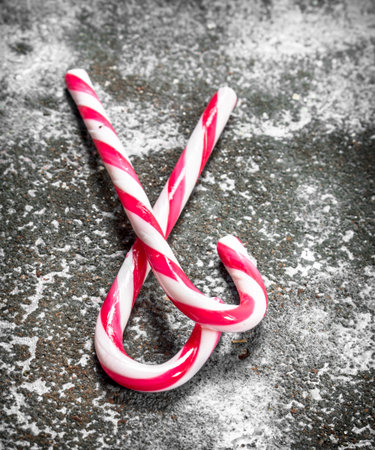 two New Years sweets. On a rustic background.の写真素材