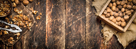 Shelled walnuts. On wooden background. Top view