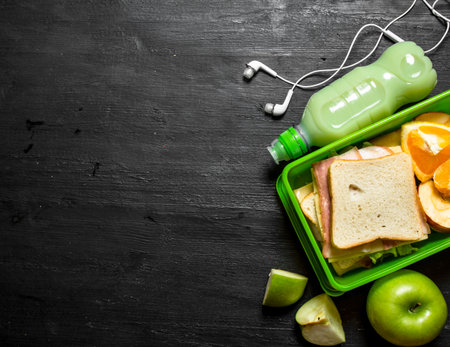 Morning picnic. Sandwiches a milkshake and fruit.の写真素材