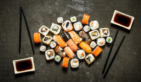 Japanese food. A variety of rolls and sushi with seafood and soy sauce.の写真素材