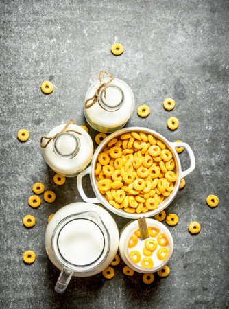 Fitness food. Corn cereal with milk. On the stone tableの写真素材