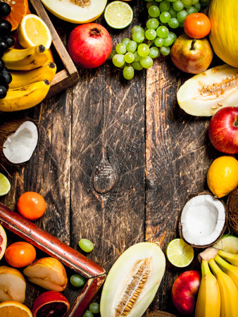 Frame from fresh fruits. On wooden Background.の写真素材