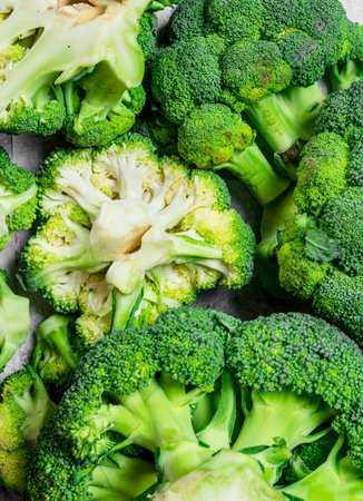 Ripe juicy broccoli. On rustic backgroundの写真素材