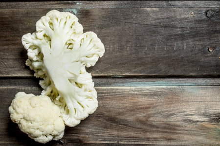 Juicy fresh cabbage. On a wooden background.の写真素材