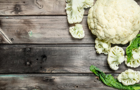 Juicy fresh cabbage. On a wooden background.の写真素材