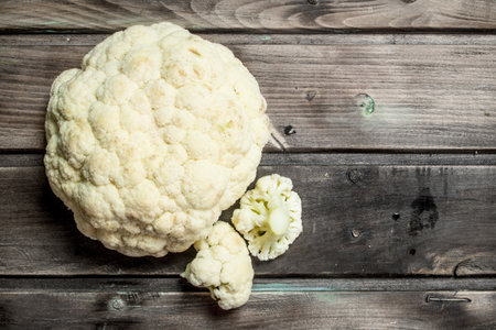 fresh cauliflower. On a wooden backgroundの写真素材