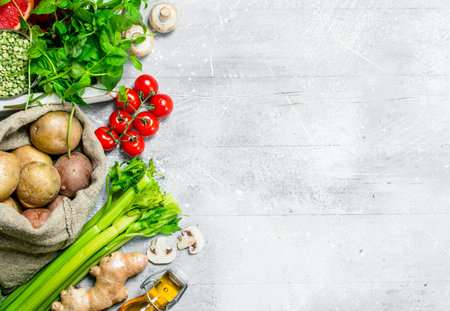Health food. Variety of organic vegetables and fruits. On a rustic background.の写真素材