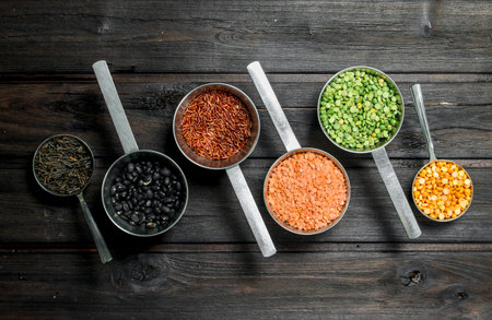 Health food. Big various of legumes. On a wooden background.の写真素材