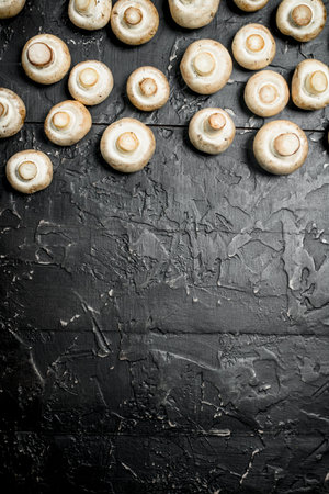 fresh fragrant mushrooms. On rustic backgroundの写真素材