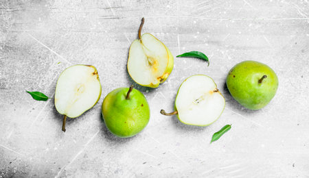 Fragrant Fresh Pears. On white rustic backgroundの写真素材