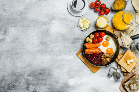 English breakfast. A variety of snacks with aromatic coffee. On a rustic background.の写真素材