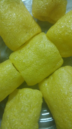 Indian crazy snack gold fingers closeupの写真素材