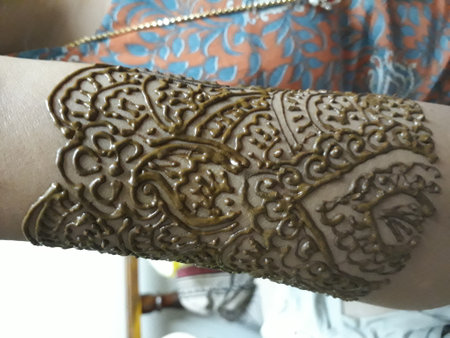 beautiful mehandi design on handの写真素材