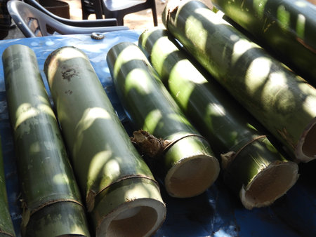 bamboo pieces used to make bamboo chicken or bamboo chicken biryani: a traditional tribal cuisine of Araku Valley, kept for saleの写真素材