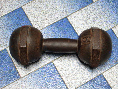 Old iron dumbellsの写真素材