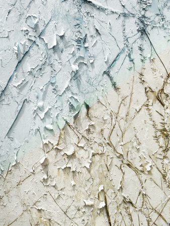 Grungy cracked white wall paint peeling offの写真素材