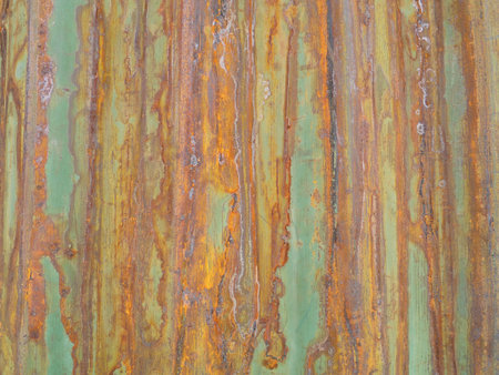 Rusty green painted metal wall with cracked paint, texture colorの写真素材