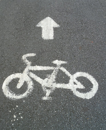 Bicycle road sign and arrowの写真素材