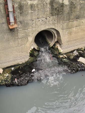 waste water pipe or drainage polluting environment, concrete pipeの写真素材