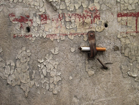 Grungy cracked white wall paint peeling offの写真素材