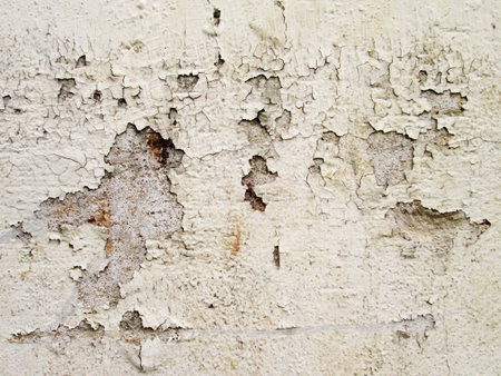 Peel-off white paint on old mansion's wallの写真素材