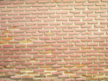 pink brick wall texture, square bricks backgroundの写真素材