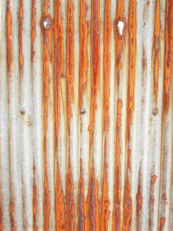 Rusted galvanized iron plateの写真素材