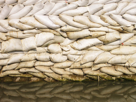 sack of sand and it's reflectionの写真素材