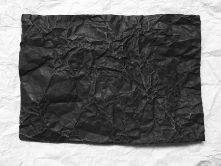 Crumpled black paperの写真素材
