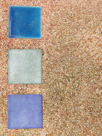 Beautiful, colorful stone wall with red bricks here and thereの写真素材