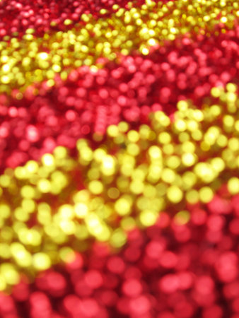 Defocused abstract red and yellow christmas backgroundの写真素材