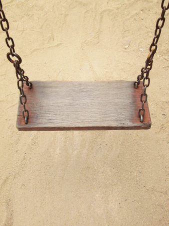 Old wooden swingの写真素材
