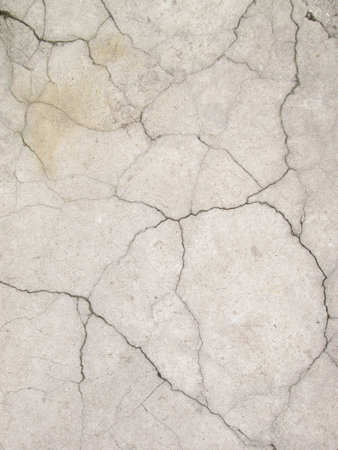 Grunge concrete cement wall with crack in industrial building, great for your design and texture backgroundの写真素材