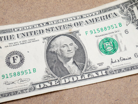 One dollar banknote on wood