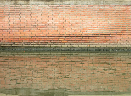 Brick wall with water reflectionの写真素材