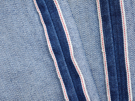 Worn denim jeans texture. Background. Close upの写真素材