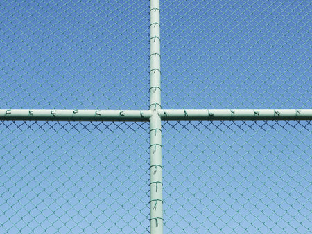Green seamless fence chain, Iron wire fence on blue sky background
