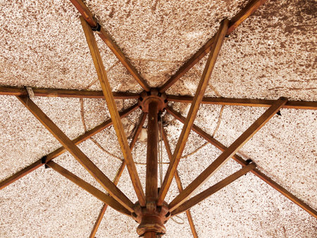 Bottom view of old umbrellaの写真素材