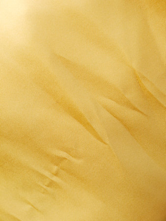 Gold thread on the fabricの写真素材